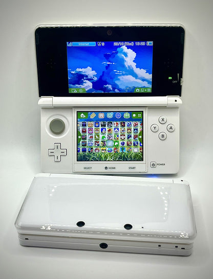 White gaming console with dual screens on a white background